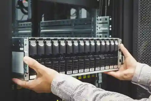 Engineer Installs Enclosure Hard Disk Drive